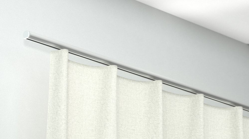 Schmale Vorhangschiene rund für die Montage an der Wand – in Aluminium