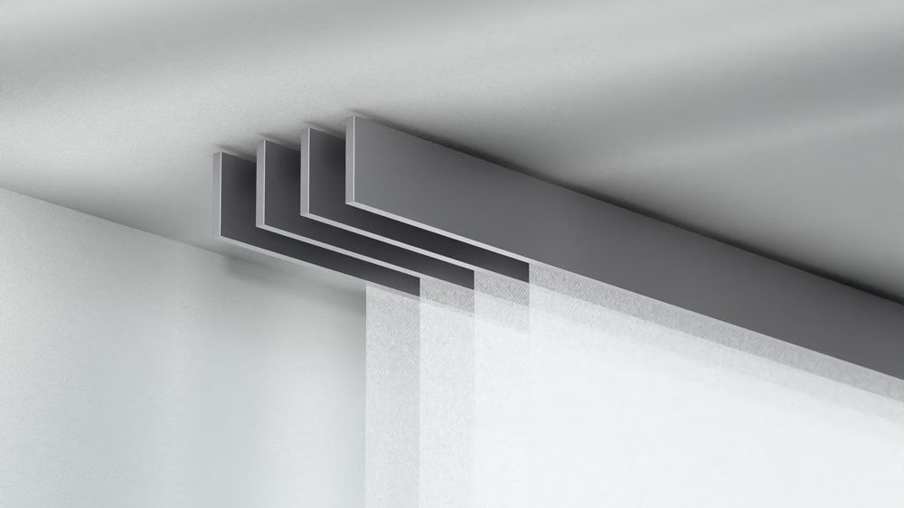 Interstil F1 Schiebegardinenschiene 4-läufig – in Edelstahl