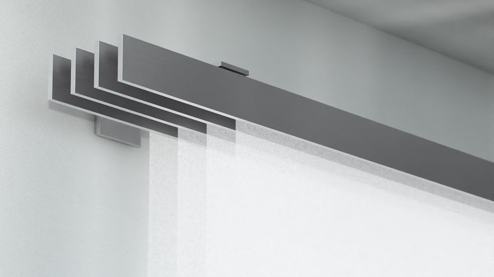 Interstil F1 Flächenvorhangschiene 4 läufig Wand – in Aluminium