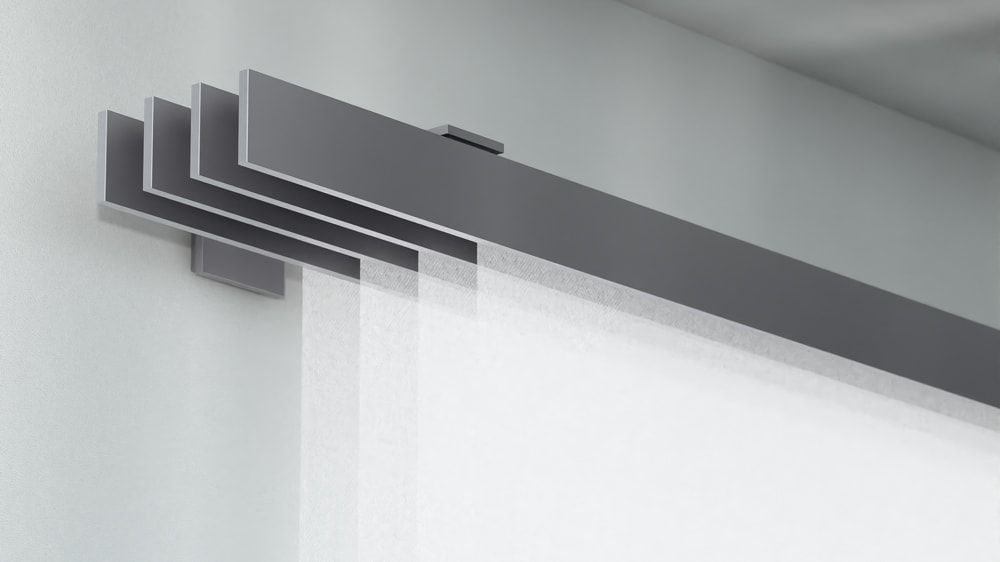 Interstil F1 Flächenvorhangschiene 4 läufig Wand – in Edelstahl