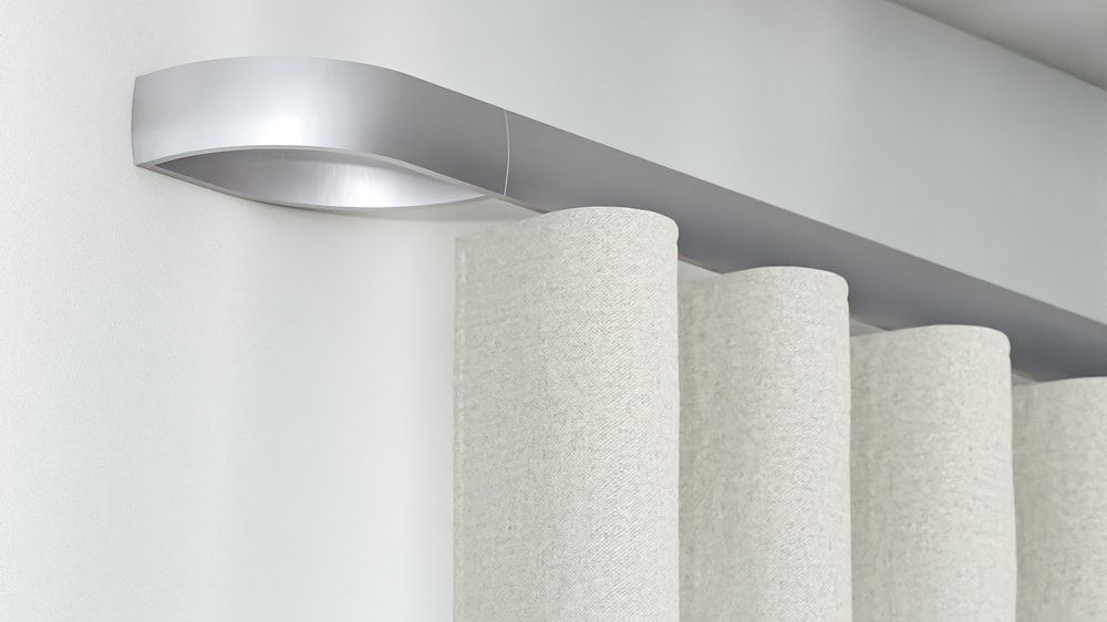 Interstil W4 kaufen Vorhangstange für Wellenvorhang – in Edelstahl