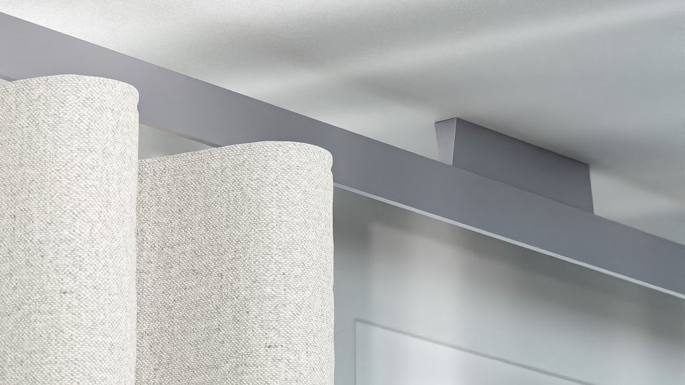 Gardinenschiene WING mit Interstil Integral – in Edelstahl