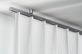 Interstil Corpus 16 mit Endkappe Diktion - filigrane Vorhangstange  – in Edelstahl
