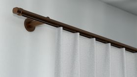 Interstil Xenon 1-läufig mit passenden Trägern und Gleitern – in Bronze